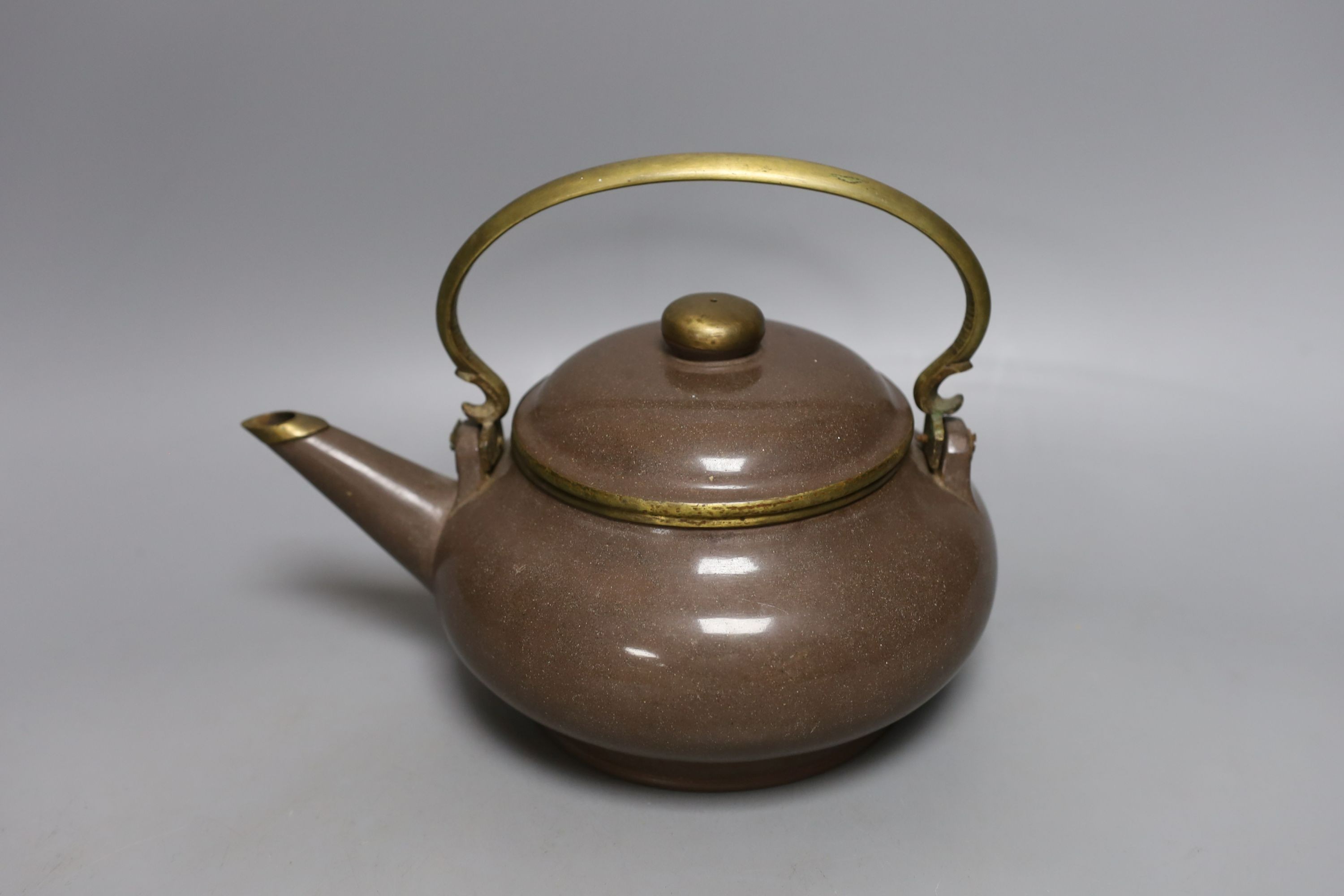 A Chinese Yixing polished pottery teapot, 19th century, made for the Thai market - 19cm tall